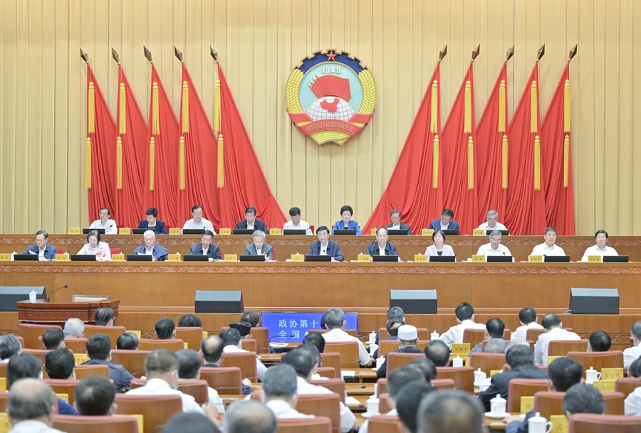 全國政協(xié)十四屆常委會第三次會議閉幕 王滬寧主持并講話